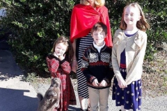 Dr. Heather Smith (relief Vet) with her children and their cat Peaches
